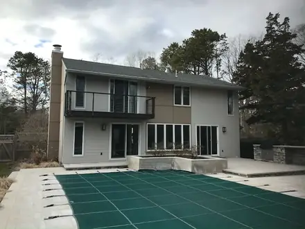 The Bello home exterior before repainting